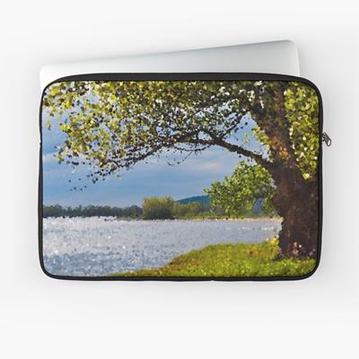 Leafy Tree on River Bank