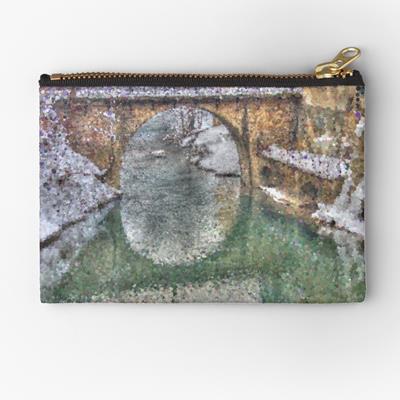 Snowy Stone Bridge Over Water